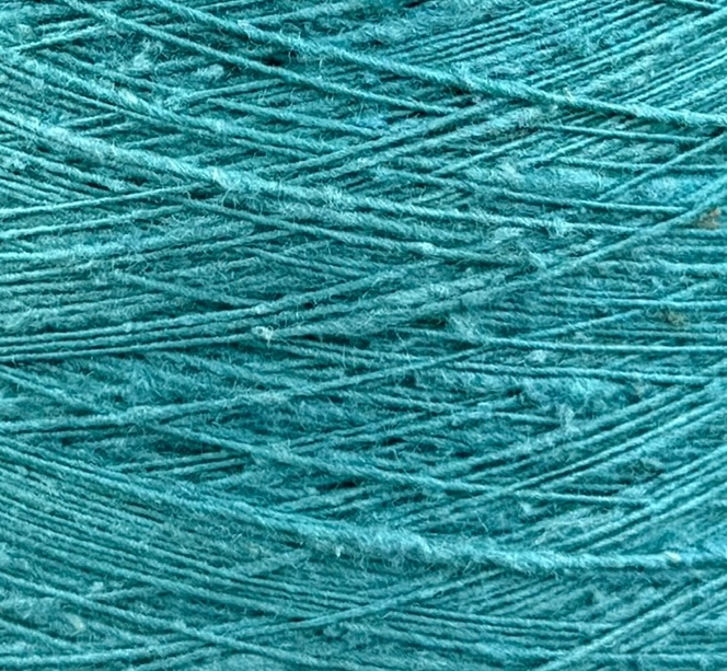 Art. Seta Tweed Bourette – Garn aus 100 % Bouretteseide mit Tweed-Effekt col. Türkis 700 m / 100 g